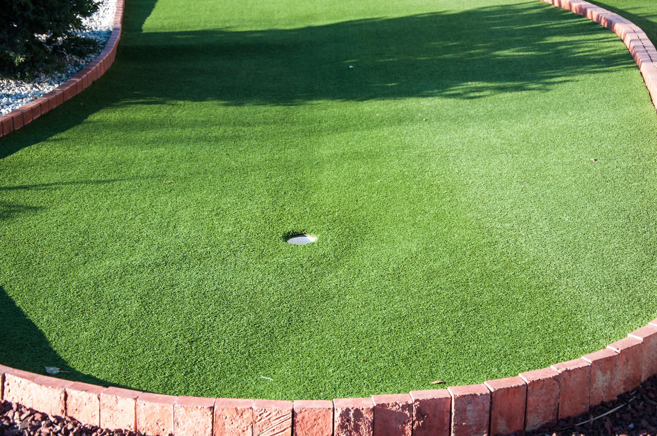 backyard custom putting green installation in Marana Arizona